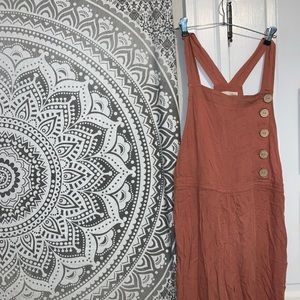 Rust colored overalls